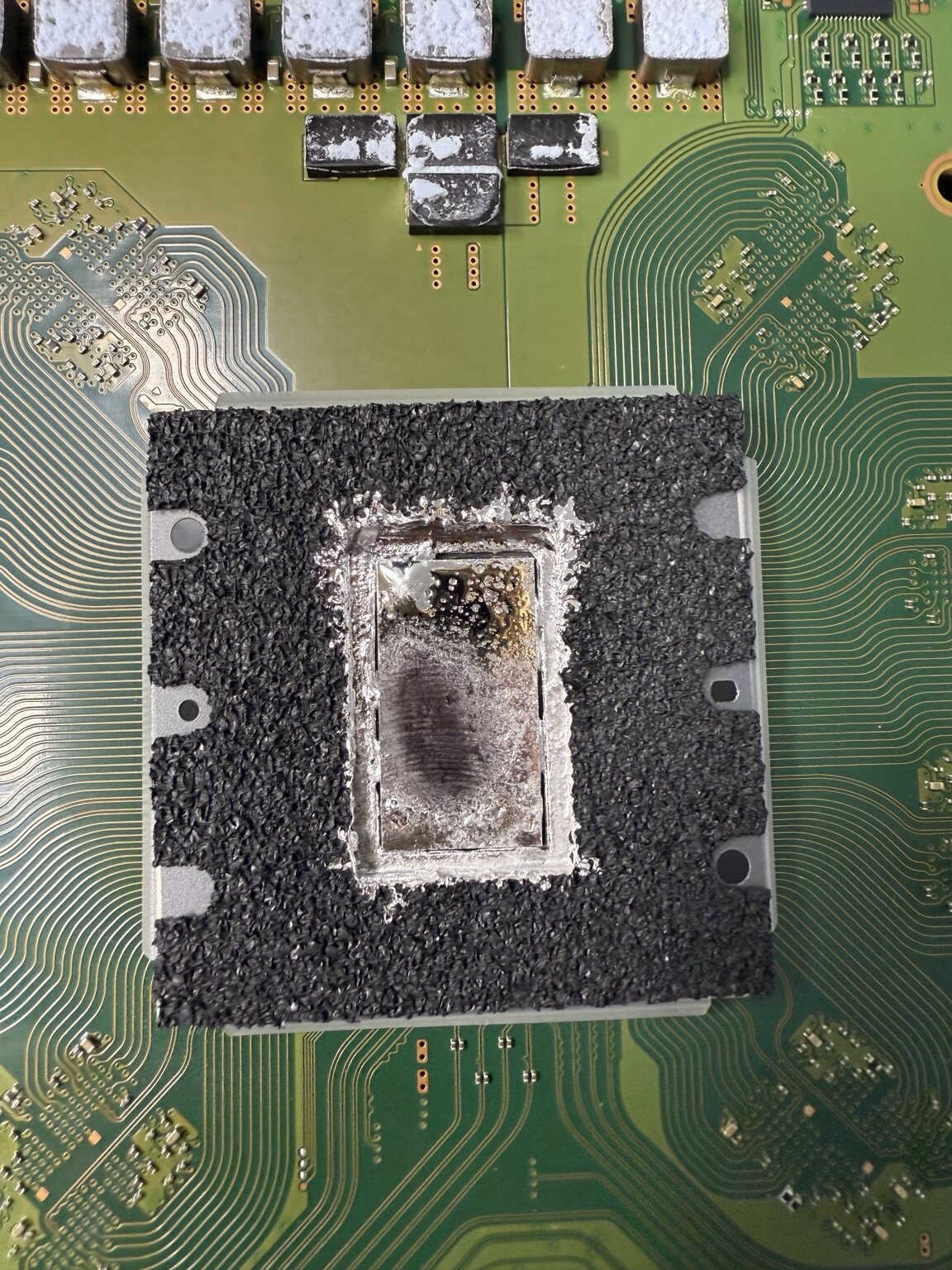 PS5 board thermal interface being inspected