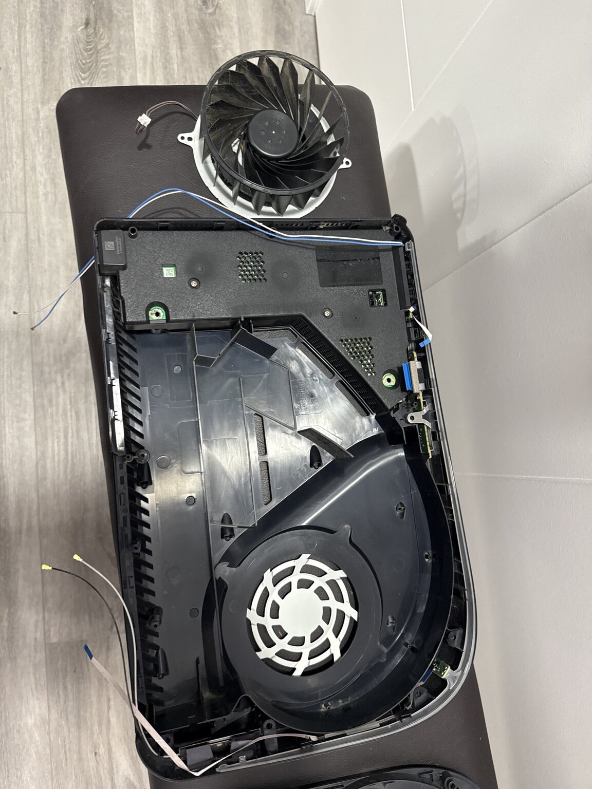 PS5 cooling assembly removed during deep cleaning