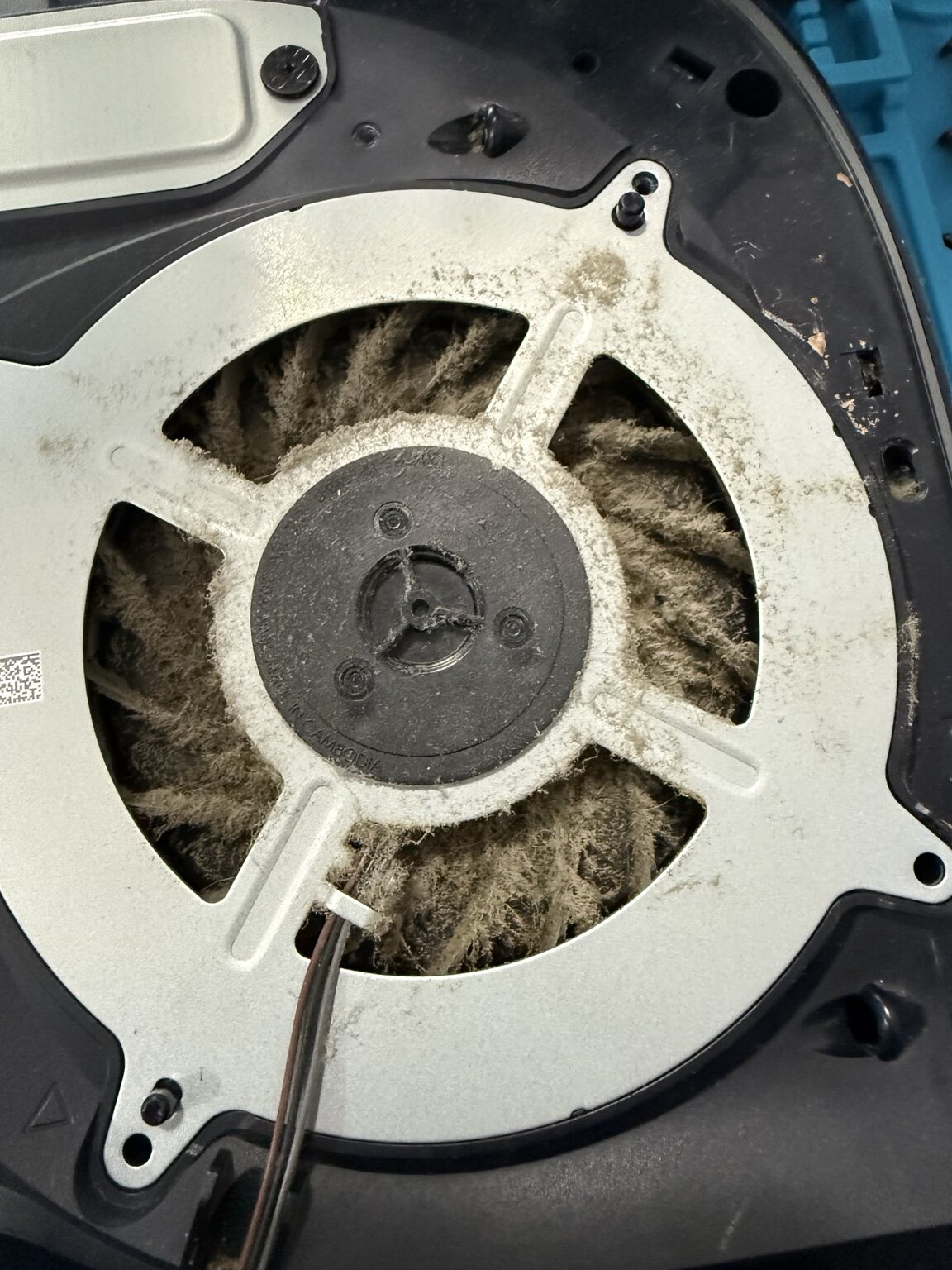 Close view of dust blocking PS5 fan blades