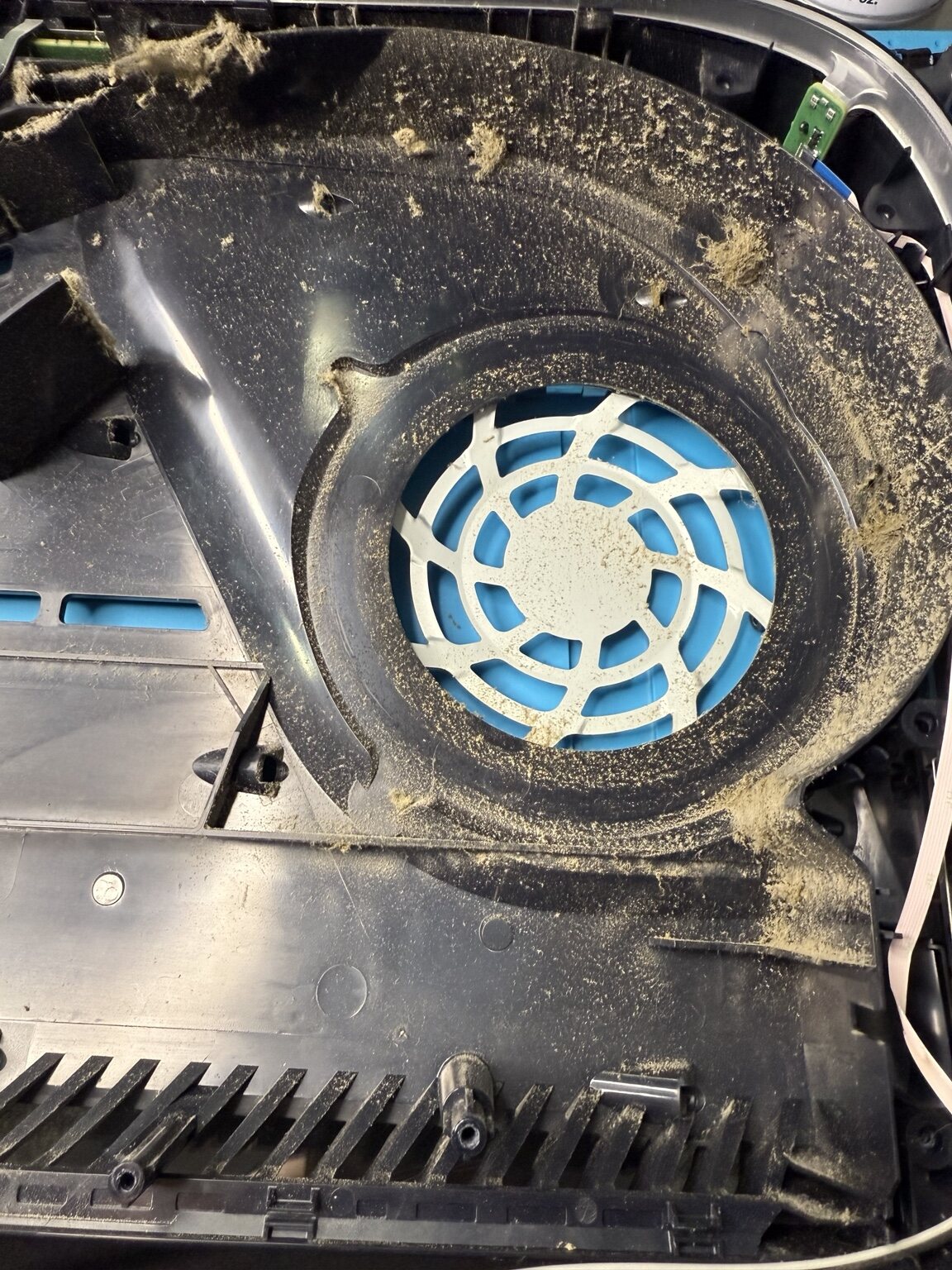 Heavy dust inside a PS5 fan housing