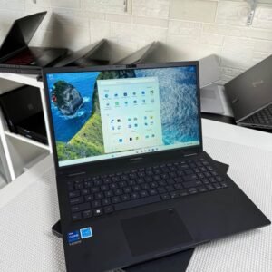 ASUS ExpertBook laptop with Intel Core i7 open on a table showing Windows 11