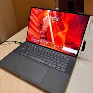 Dell Precision 5560 15.6-inch laptop open on a desk showing the lock screen