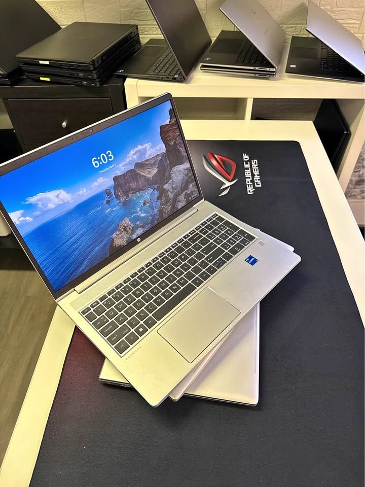 Silver HP ProBook 450 G10 laptop open showing the Windows 11 lock screen