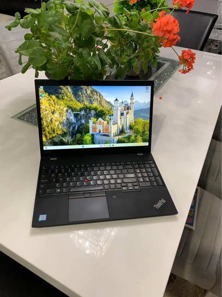 Lenovo ThinkPad E580 15.6-inch laptop open on a white table