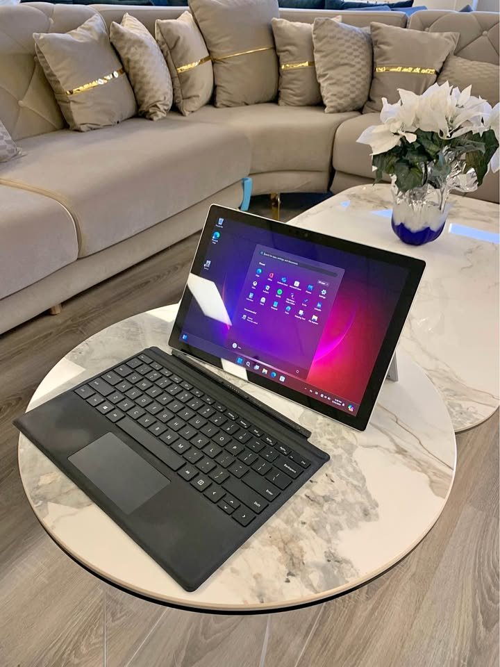 Microsoft Surface Pro 7 with keyboard cover on a table